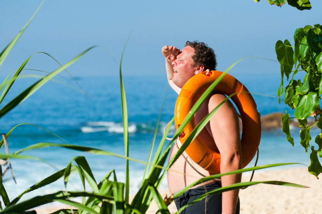 man felling hot due to october heat. Image source :pexels