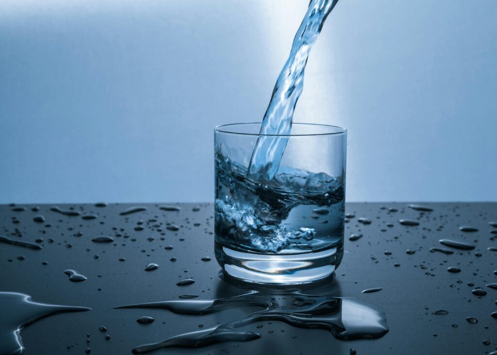 for hydration purpose glass is filling with water