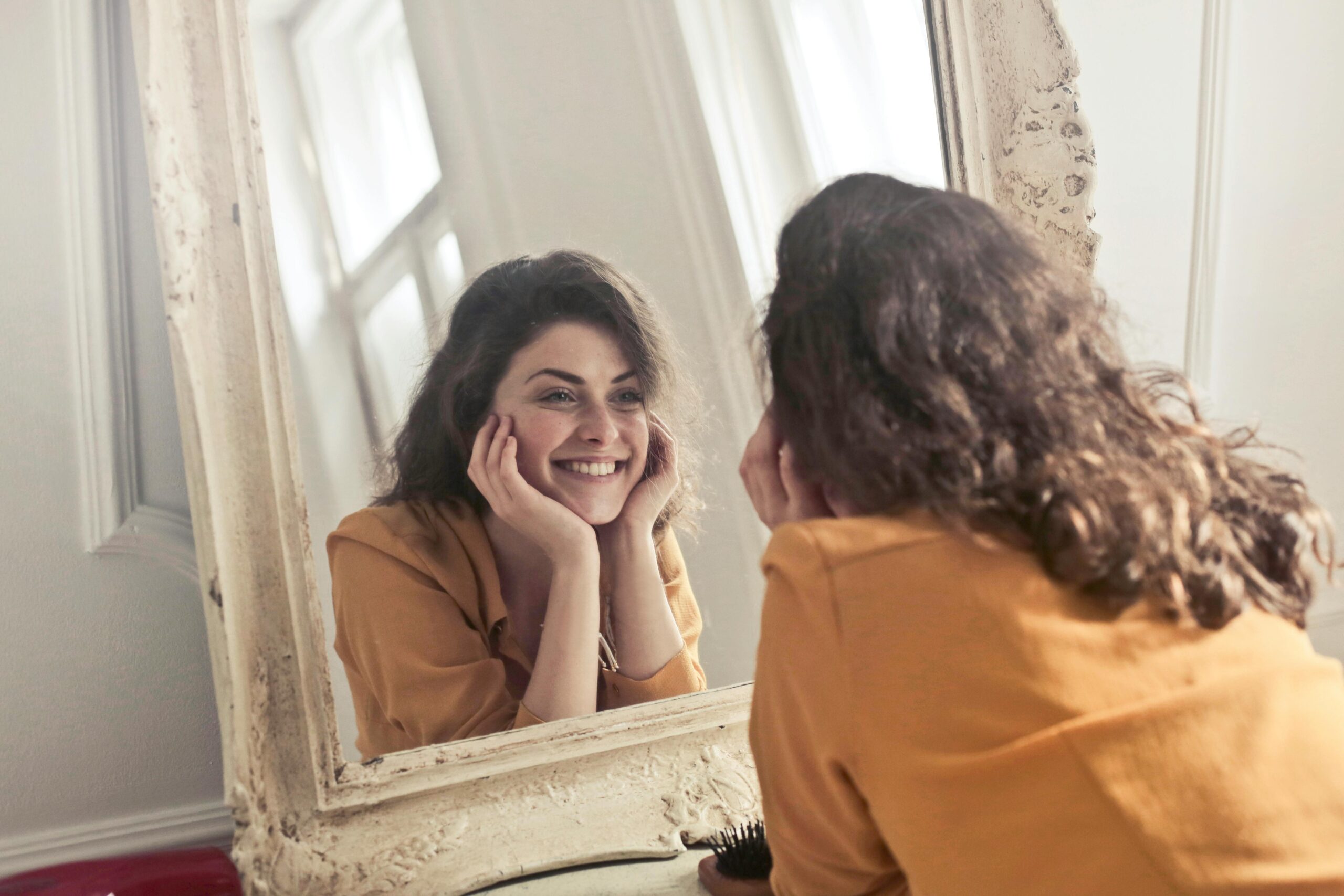 girl embracing self love. image source: pexels