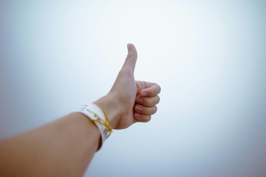 Hand gesture indicating it is best to use positive affirmation
